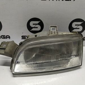 PROIETTORE SX. usato - FIAT PUNTO 1A SERIE (11/93>10/99<)